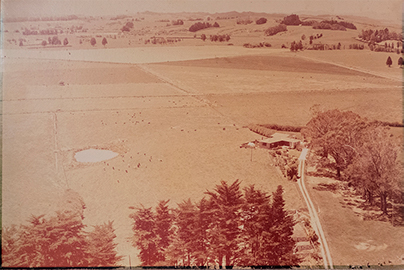 grandfather's large farm photo is very faded 