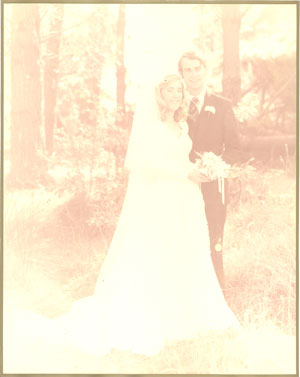 badly faded wedding photo recreated,recoloured and restored